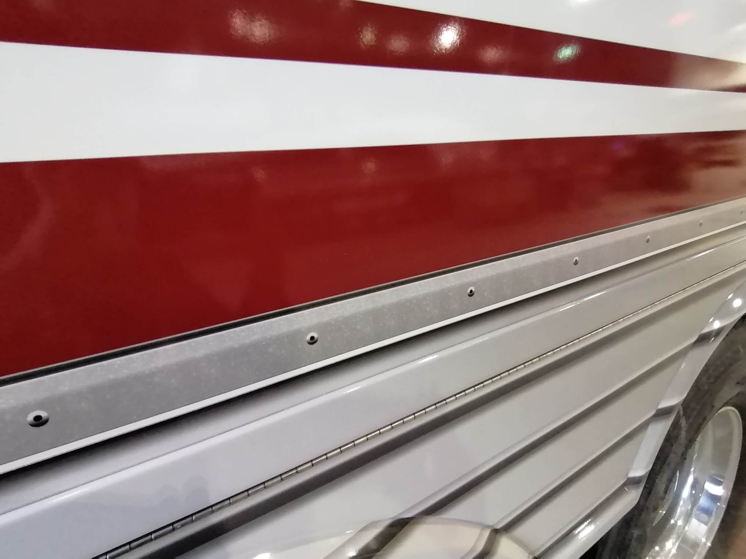 Bus wrap with metallic and rivet effects by Turbo Images