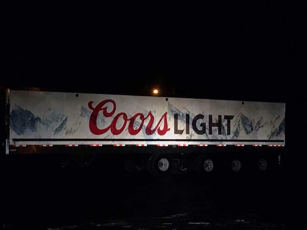 Reflective Coors Light trailer vinyl wrap job by Turbo Images the leader in vehicle graphics and trailer wraps so that your trailers will have a great marketing impact with their nice wraps. For a great design and custom vinyl truck or trailer wrapping job, contact Turbo Images. 